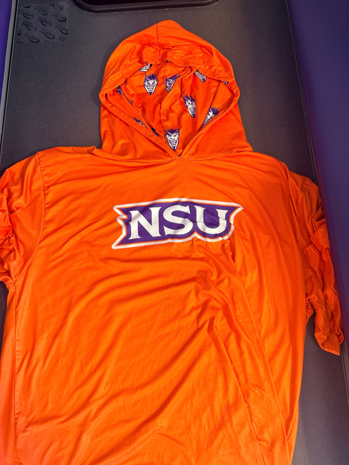 Orange NSU short sleeve hooded shirt with Demon print hood lining